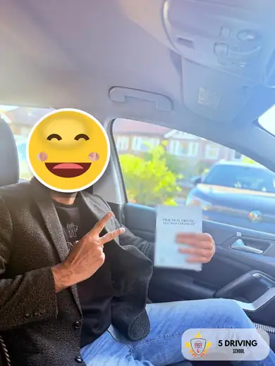 5 Driving School pupil holding their driving test pass certificate