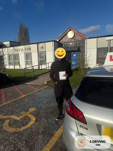 5 Driving School pupil holding their driving test pass certificate